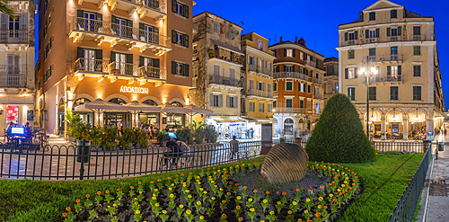 View of restaurants and bars in Pot throwing (Botides) at dusk, Corfu Town, Corfu, Ionian Sea, Greek Islands, Greece, Europe