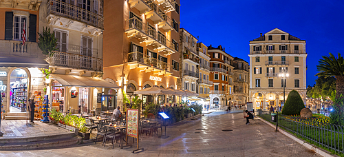 View of restaurants and bars in Pot throwing (Botides) at dusk, Corfu Town, Corfu, Ionian Sea, Greek Islands, Greece, Europe