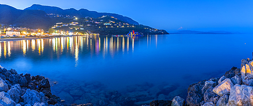 View of Ionian Sea and Ipsos Beach in Ipsos at dusk, Ipsos, Corfu, Ionian Sea, Greek Islands, Greece, Europe