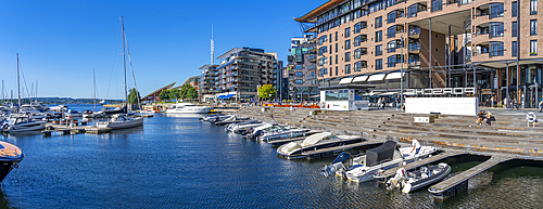 View of boats and architecture at the waterfront, Aker Brygge, Oslo, Norway, Scandinavia, Europe