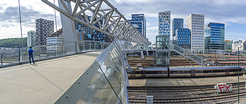 View of the Barcode buildings and Akrobaten bridge on a sunny day, Oslo, Norway, Scandinavia, Europe