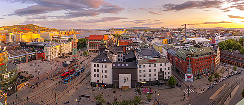 View of Jernbanetorget and city skyline from elevated position at sunset, Oslo, Norway, Scandinavia, Europe