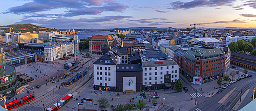 View of Jernbanetorget and city skyline from elevated position at sunset, Oslo, Norway, Scandinavia, Europe