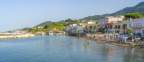 View of beach and town of Lacco Ameno, Island of Ischia, Campania, Italy, Europe