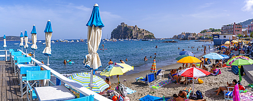 View of Miramare e Castello beach and Aragonese Castle in background, Port of Ischia, Island of Ischia, Campania, Italy, Europe