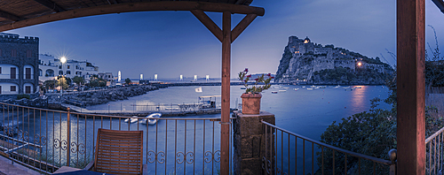 View of Aragonese Castle at dusk, Port of Ischia, Island of Ischia, Campania, Italy, Europe