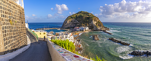 Couple viewing Torre di Sant'Angelo from elevated position in Sant'Angelo, Sant'Angelo, Island of Ischia, Campania, Italy, Europe