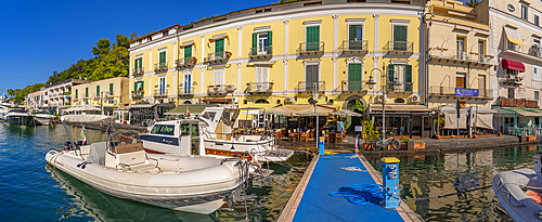 View of boats and restaurants in Porto d'Ischia (Port of Ischia), Island of Ischia, Campania, Italy, Europe