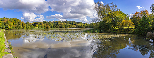 View of dramatic clouds refecting in Hardwick Ponds, Hardwick Park, Hardwick Hall, Bolsover, Derbyshire, England, United Kingdom, Europe