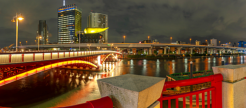 View of Azuma Bridge and Sumida River at night, Asakusa, Taito City, Tokyo, Honshu, Japan