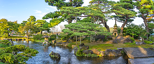 View of Japanese stone lantern and pagoda in Kenrokumachi Japanese Garden, Kanazawa City, Ishikawa Prefecture, Honshu, Japan, Asia