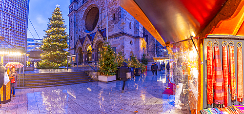 View of Kaiser Wilhelm Memorial Church and market stall at Christmas, Breitscheidplatz, Berlin, Germany, Europe