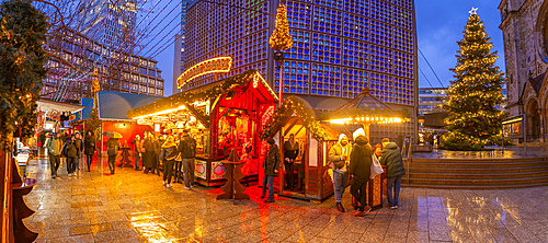 View of Kaiser Wilhelm Memorial Church and market stalls at Christmas, Breitscheidplatz, Berlin, Germany, Europe