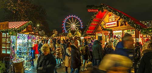 View of ferris wheel and Christmas market in Wasserkaskaden at dusk, Mitte, Berlin, Germany, Europe