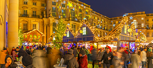 View of Christmas market stalls in Schlüterhof des Berliner Schlosses at dusk, Mitte, Berlin, Germany, Europe