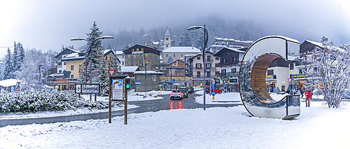 View of C di Courmayer and the snow covered town centre in winter, Courmayeur, Aosta Valley, Italy, Europe