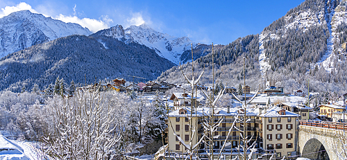 View of snow covered trees, mountains and Dolonne from Courmayeur during winter, Courmayeur, Aosta Valley, Italy, Europe