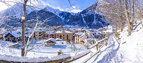 View of snow covered mountains and rooftops in Courmayeur during winter, Courmayeur, Aosta Valley, Italy, Europe