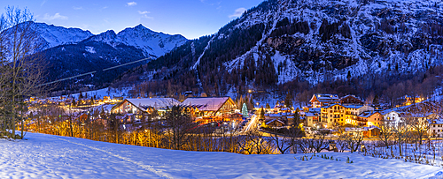 View of snow covered mountains and Dolonne at dusk in winter, Courmayeur, Aosta Valley, Italy, Europe