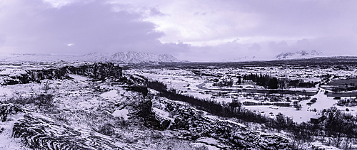 View of continental drift between the North American and Eurasian tectonic plates in Thingvellir National Park during winter, Western Region, Iceland, Europe