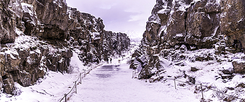 View of continental drift between the North American and Eurasian tectonic plates in Thingvellir National Park during winter, Western Region, Iceland, Europe