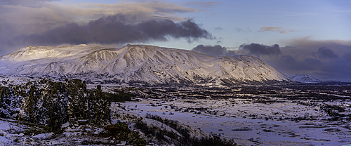 View of continental drift between the North American and Eurasian tectonic plates in Thingvellir National Park during winter, Western Region, Iceland, Europe