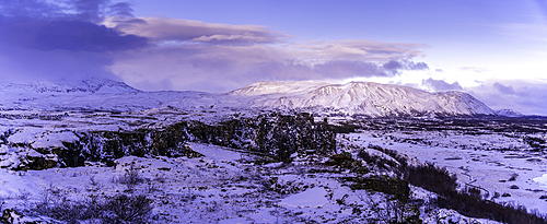 View of continental drift between the North American and Eurasian tectonic plates in Thingvellir National Park during winter, Western Region, Iceland, Europe