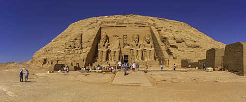 Exterior view of tourists and massive sculptures at the Abu Simbel Temple next to Lake Nasser, Temple of the Pharaohs, Ramses II, Nubia, Egypt, Africa