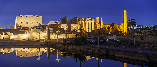 View of Karnak Temple sound and light show at dusk, Luxor, Egypt, Africa