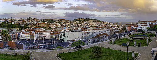 View of Lisbon from Miradouro de São Pedro de Alcântara at sunset, Lisbon, Portugal, Europe