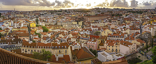 Panoramic view of Lisbon from Miradouro da Senhora do Monte scenic point at sunset in the Alfama District, Lisbon, Portugal, Europe