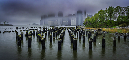 View of Lower Manhattan from Old Pier 1 on a rainy day, Brooklyn Bridge Park, New York City, United States of America, North America