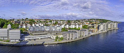 Aerial view of buildings aligning shore approaching Stavanger, Stavanger, Norway, Scandinavia, Europe