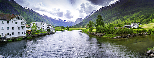 View of Olden village, mountains and Oldeelva river in Nordfjorden during summer, Norway, Scandinavia, Europe