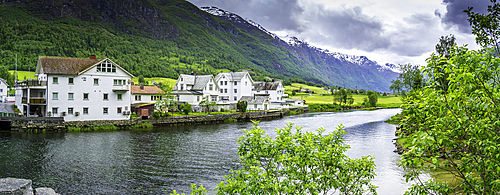 View of Olden village, mountains and Oldeelva river in Nordfjorden during summer, Norway, Scandinavia, Europe