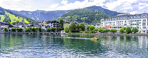 View of the Grand Hotel and Lake Zell from cruise boat on a sunny day, Zell am See, Salzburg, Austria, Europe