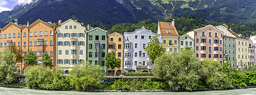 View of colourful buildings and River Inn on a sunny day in summer, Innsbruck, Tyrol Region, Austria, Europe