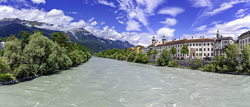 View of St. Jakob Cathedral, colourful buildings and River Inn on a sunny day in summer, Innsbruck, Tyrol Region, Austria, Europe