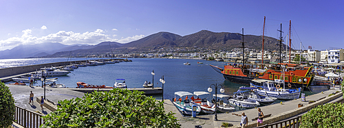 View of boats in Limenas Chersonisou Port, Limenas Chersonisou, Crete, Greek Islands, Greece, Europe