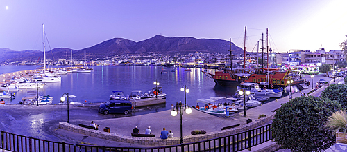 View of boats in Port of Limenas Chersonisou at dusk, Limenas Chersonisou, Crete, Greek Islands, Greece, Europe