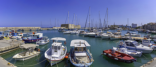 View of Koules Venetian Fortress and boats in Heraklion Venetian Port on a sunny day, City of Heraklion, Crete, Greek Islands, Geece, Europe