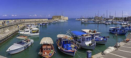 View of Koules Venetian Fortress and boats in Heraklion Venetian Port on a sunny day, City of Heraklion, Crete, Greek Islands, Geece, Europe