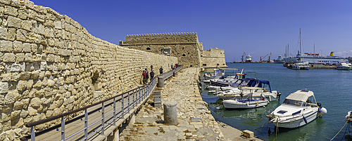 View of Koules Venetian Fortress and boats in Heraklion Venetian Port on a sunny day, City of Heraklion, Crete, Greek Islands, Geece, Europe