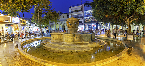 View of Morosini Fountain at dusk, City of Heraklion, Crete, Greek Islands, Geece, Europe