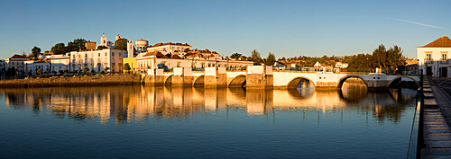 Seven arched Roman bridge and town on the Rio Gilao river, Tavira, Algarve, Portugal, Europe