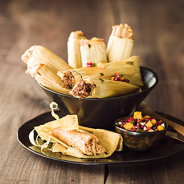 Bowl of tamales with salsa