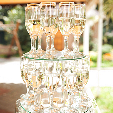 Stack of champagne in champagne flutes