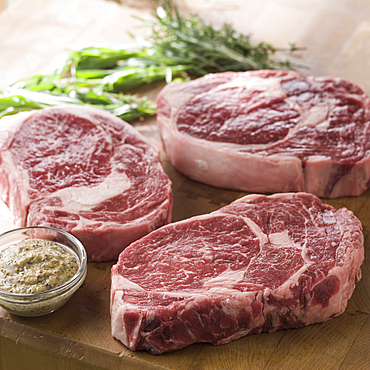 Raw ribeye steaks