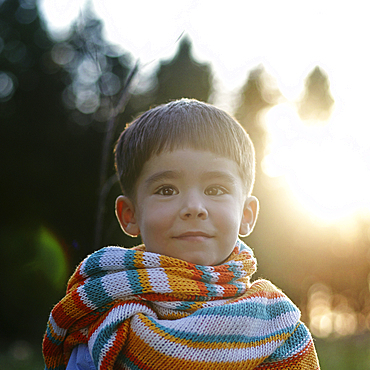 Portrait of Caucasian girl wearing multicolor scarf