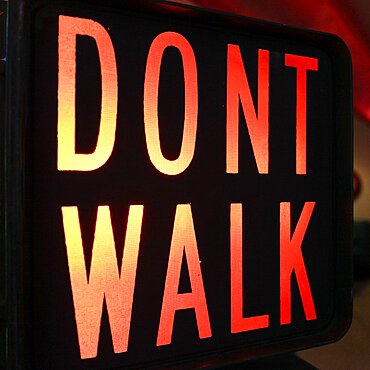Close-up of illuminated traffic sign